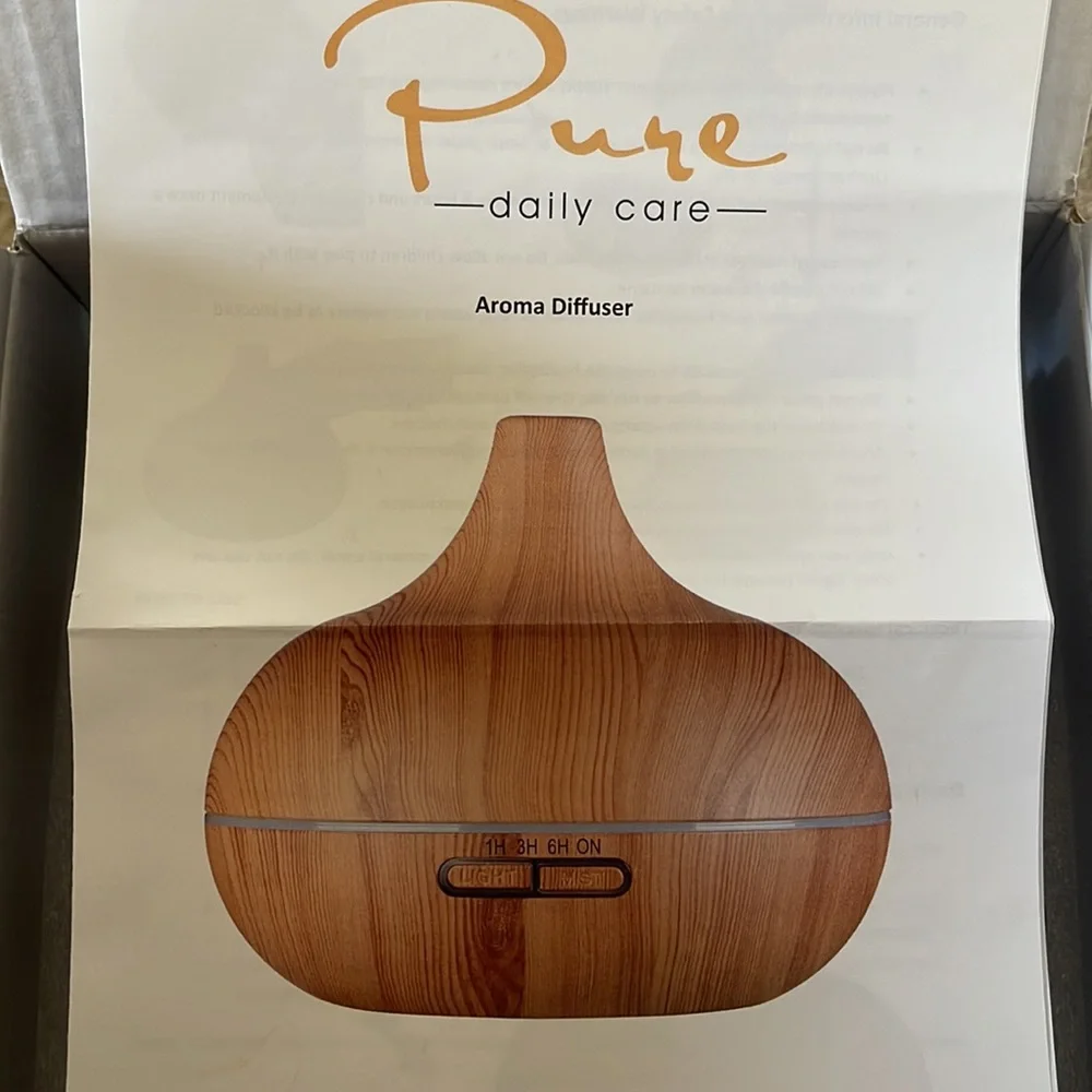NIB Pure Daily Care Ultrasonic Aromatherapy Diffuser with 10 Pure Essential Oils